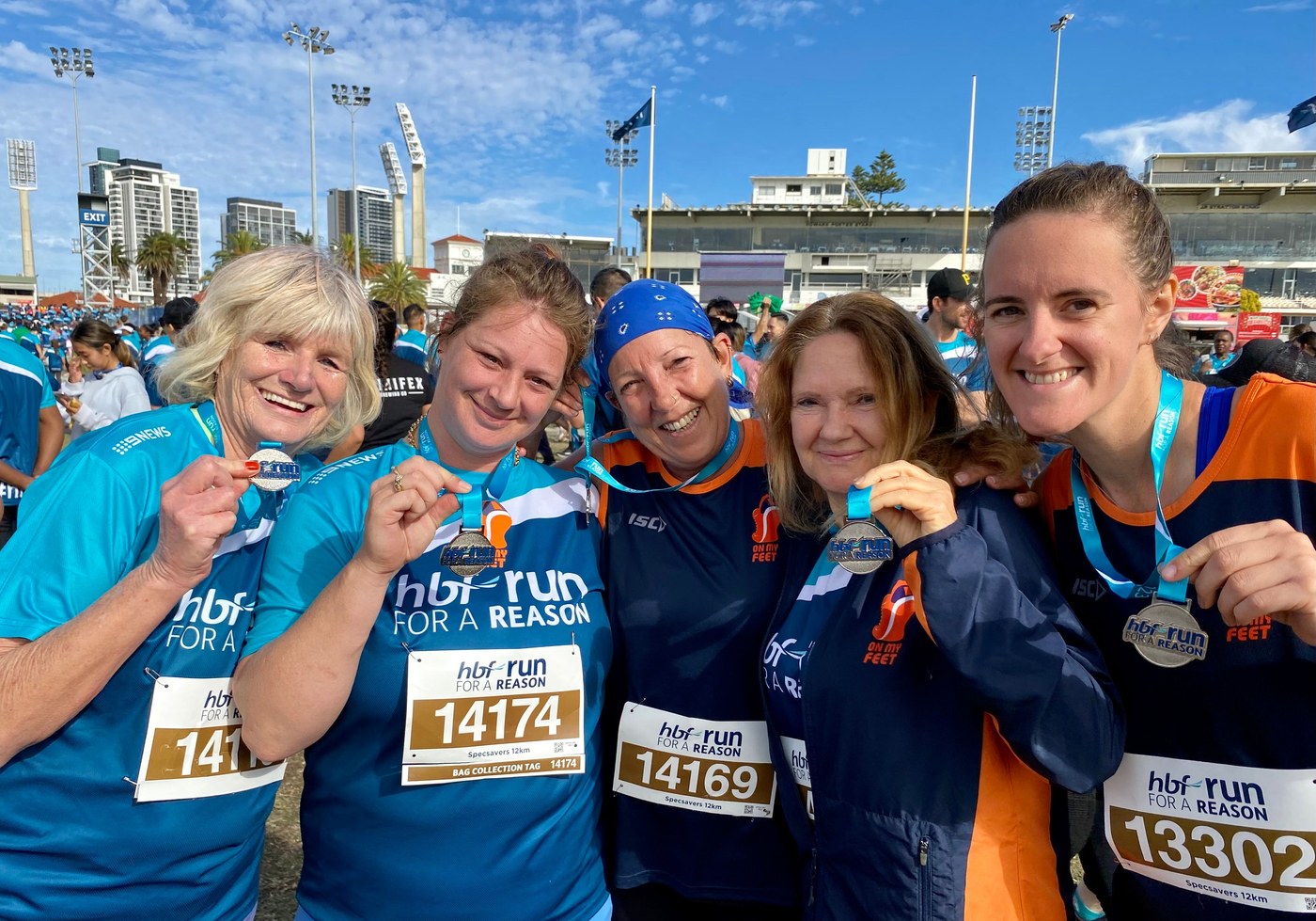 On My Feet runners with their medals at the HBF Run for a Reason